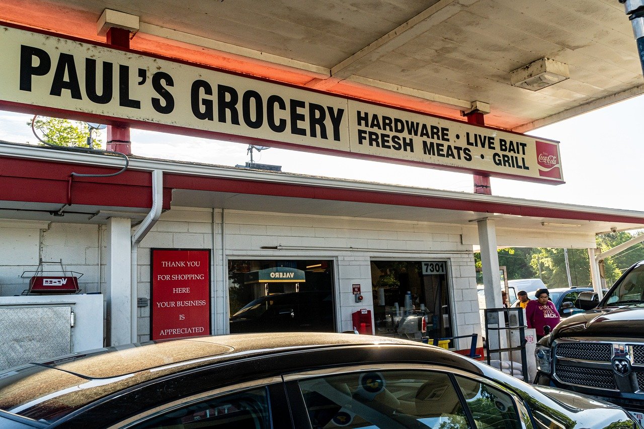 Convenience store with cars parked for gas.